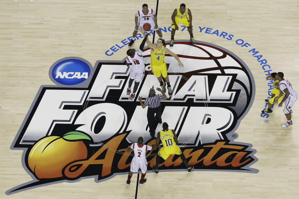 Louisville must vacate its 2013 national title and 2012 Final Four appearance after an NCAA decision on Tuesday. (AP)