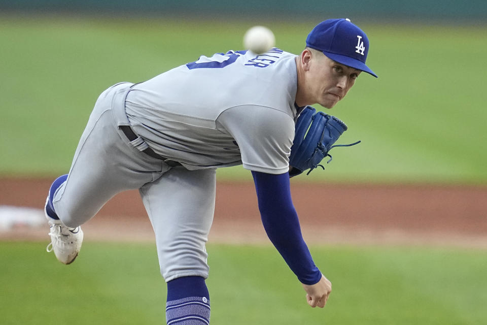 Los Angeles Dodgers' Bobby Miller pitches to a Cleveland Guardians batter the first inning of a baseball game Tuesday, Aug. 22, 2023, in Cleveland. (AP Photo/Sue Ogrocki)