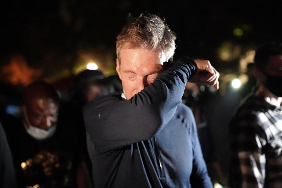 Portland Mayor Ted Wheeler reacts after being exposed to tear gas fired by federal officers while attending a protest against police brutality and racial injustice in front of the Mark O. Hatfield U.S. Courthouse on July 22 in Portland, Oregon. (Photo: Nathan Howard via Getty Images)