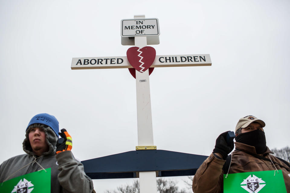 Anti-abortion protesters carry a cross at the March for Life on January 25, 2013 in Washington, DC. The pro-life gathering is held each year around the anniversary of the Roe v. Wade Supreme Court decision. (Photo by Brendan Hoffman/Getty Images)