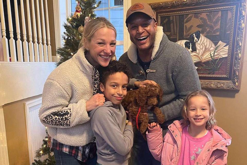 <p>Craig Melvin/Instagram</p> Craig Melvin and Lindsay Czarniak with their children, Delano and Sybil, holding their dog, Myles