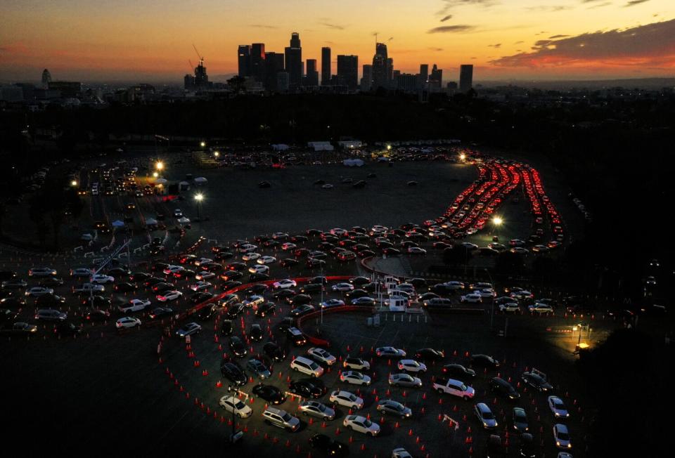 Long line of cars for COVID-19 testing at Dodger Stadium