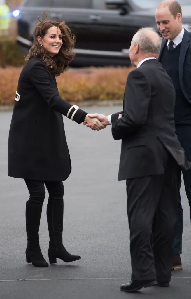 <p><strong>When: Nov. 22, 2017</strong><br>The Duchess hid her baby bump in a black coat by Goat and paired it with a pair of skinny black jeans, a matching knit and a pair of $511 USD Russell & Bromley suede riding boots. <em>(Photo: Getty)</em> </p>