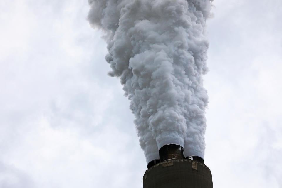 A strong plume of exhaust belches into the air from the Harrison Power Station.