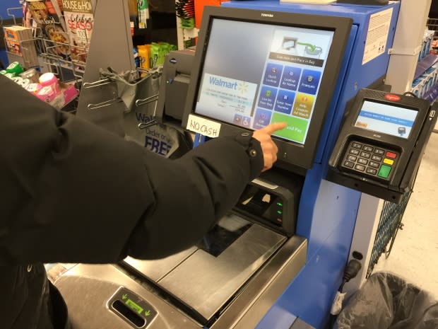 Walmart ramps up self-checkout, scales down 'scan and go' shopping