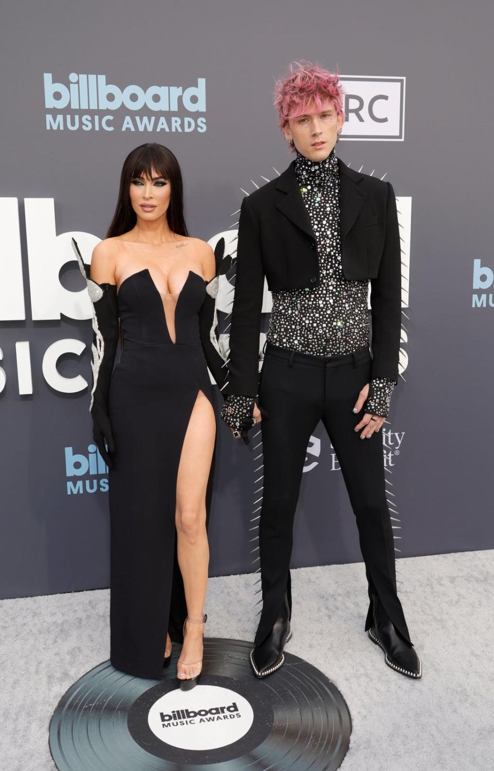 MGK and Megan Fox pose on red carpet at Billboard Music Awards (Getty Images)