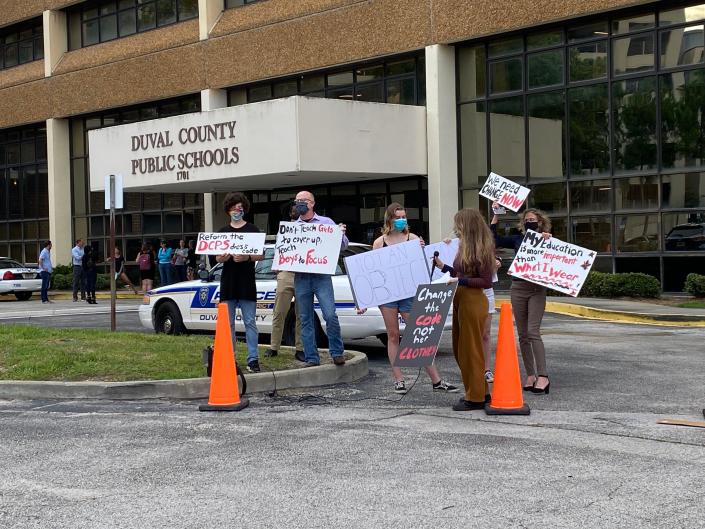 Community members protest against Duval Schools' dress code at the beginning of the school year.