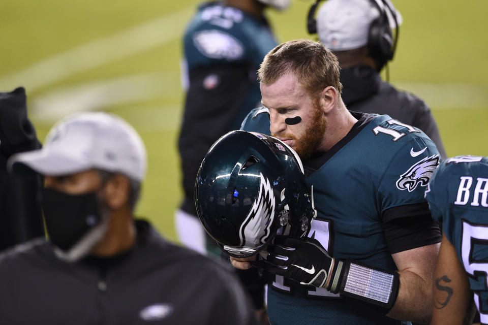 Philadelphia Eagles' Carson Wentz walks the sidelines during the second half of an NFL football game against the Seattle Seahawks, Monday, Nov. 30, 2020, in Philadelphia. (AP Photo/Derik Hamilton)