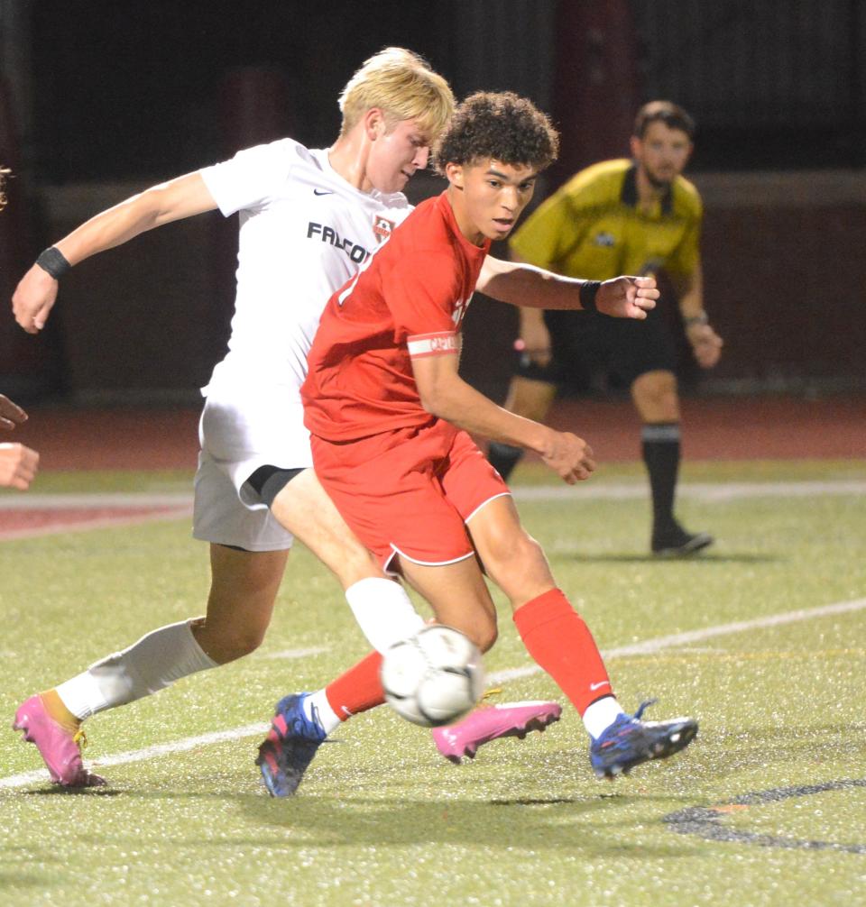 NFA senior Louis Hawkins delivers a pass during the Wildcats' 3-0 Senior Night win against Fitch on Thursday in Norwich.