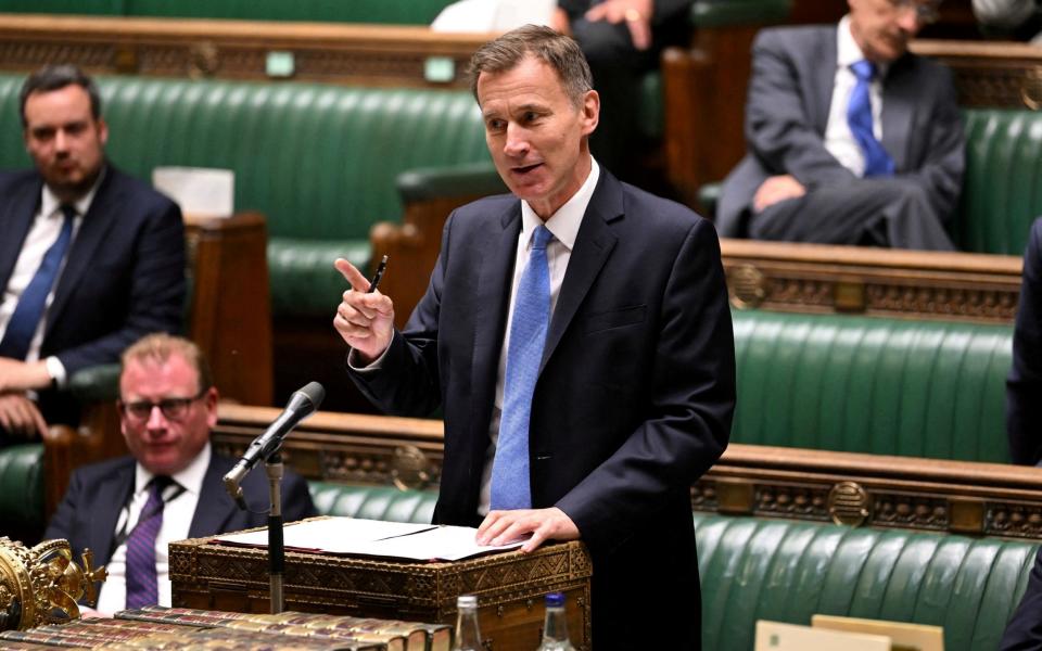 British Chancellor of the Exchequer Jeremy Hunt holds a Ministerial Statement at the House of Commons in London