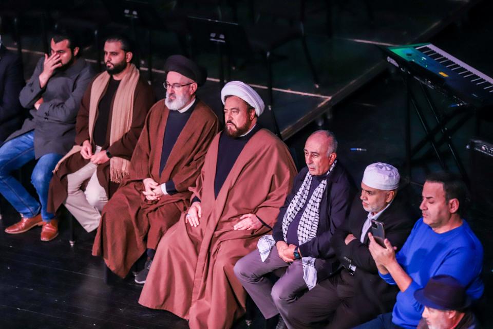 Community leaders wait to speak during a community rally in support of freeing Palestine at Ford Community & Performing Arts Center in Dearborn on Tuesday, Oct. 10, 2023. Hamas militants attacked Israel on Saturday, killing more than 900 people, including at least 14 Americans. Israel has responded with a siege and heavy bombing of the Gaza Strip resulting in over 1500 deaths total.