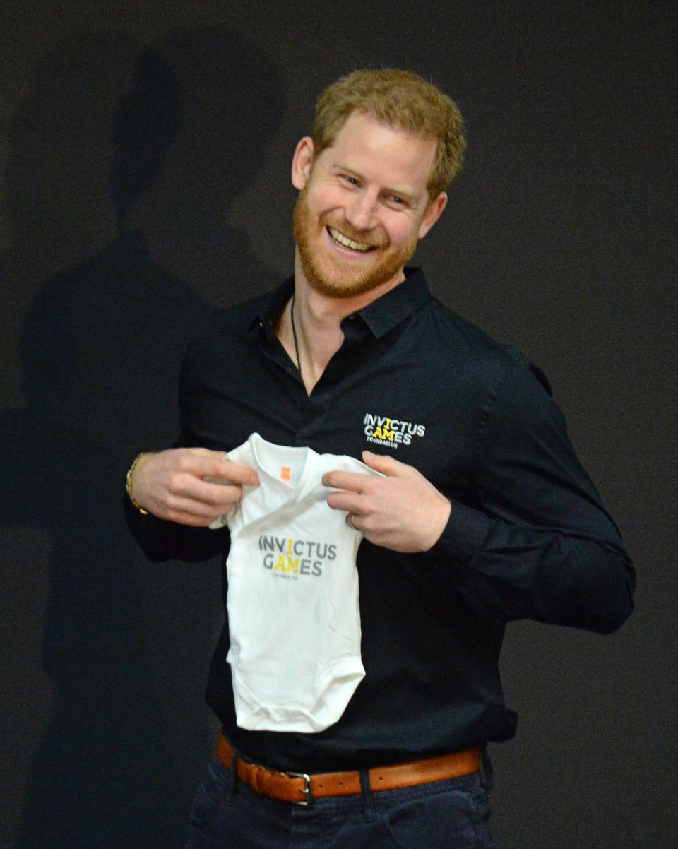 The Duke of Sussex receives a gift for his new son Archie during a visit to The Hague [Photo: PA]