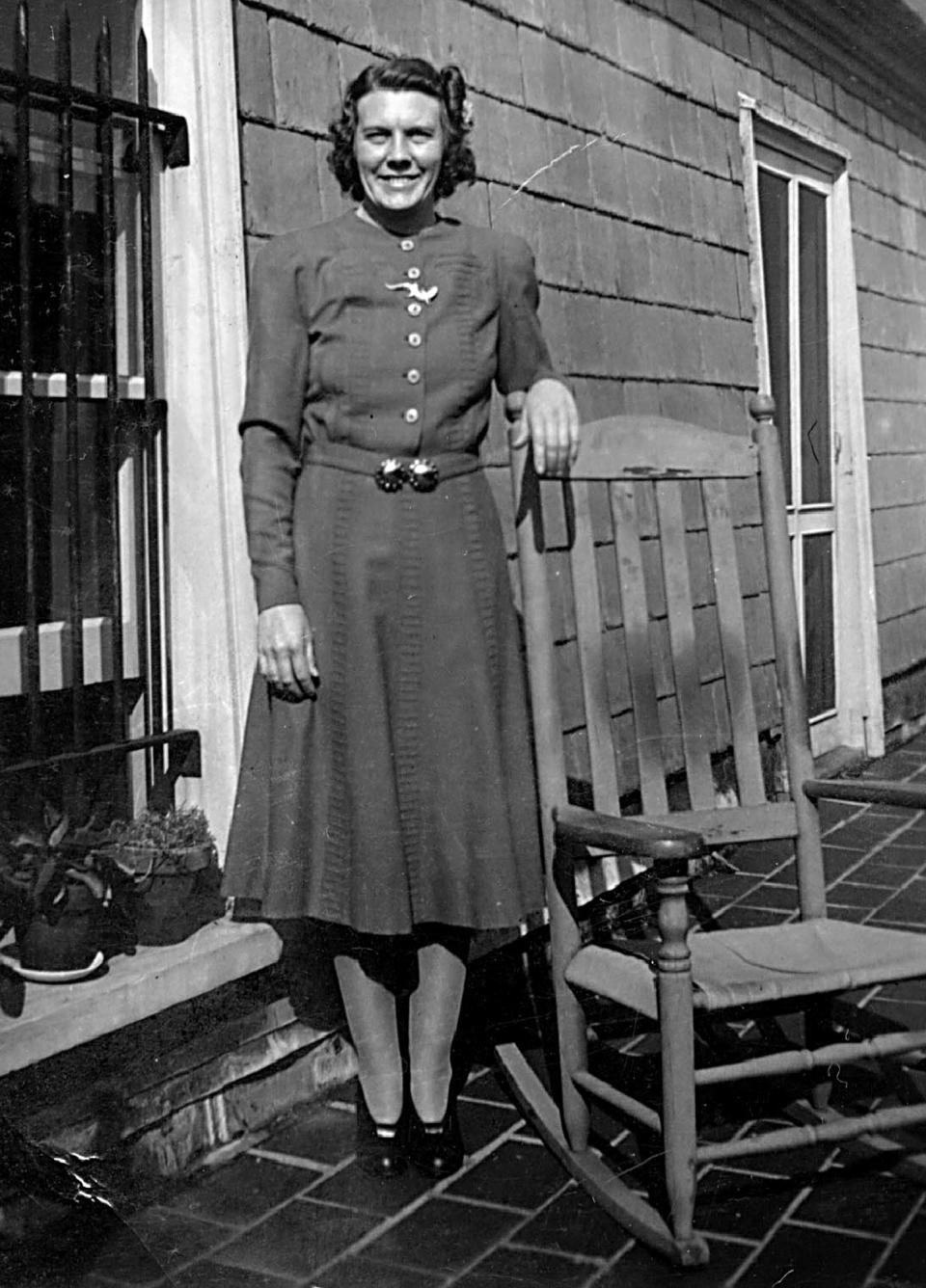 This circa 1940s photo provided by The Preservation Society of Newport County shows maid Nellie Lynch on the roof outside the servants' quarters of The Elms mansion in Newport, R.I. Newly discovered photographs, documents and family histories have inspired the creation of a tour about servants at The Elms, echoing themes of the British drama program, "Downton Abbey." (AP Photo/The Preservation Society of Newport County)