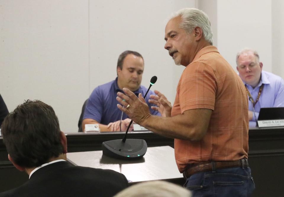 Stow resident David Conti speaks out on the planned Miller's Landing subdivision Thursday during a Stow City Council meeting.