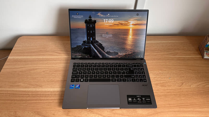 Acer Swift X 16 laptop open on a wooden desk