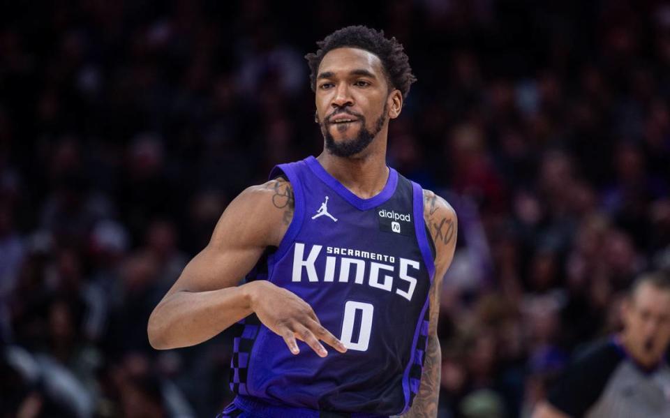 Sacramento Kings guard De’Aaron Fox (5) celebrates a three point basket as he scored a team high 23 points during an NBA game against the Denver Nuggets on Friday, Feb. 9, 2024 at Golden 1 Center. Hector Amezcua/hamezcua@sacbee.com