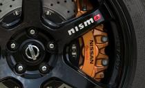 <p>Big Brembo brake calipers boast six-pistons on the front wheels, four on the rears, and bring the big car to a halt in 148 feet from 70 mph.</p>