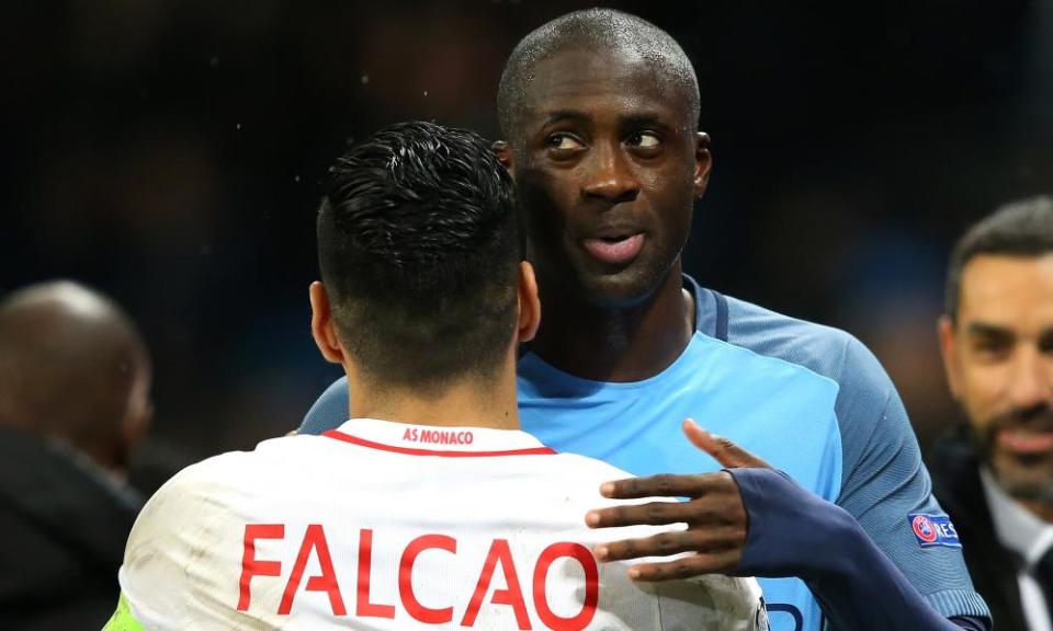 Manchester City's Yaya Touré with Radamel Falcao of Monaco after the Champions League match