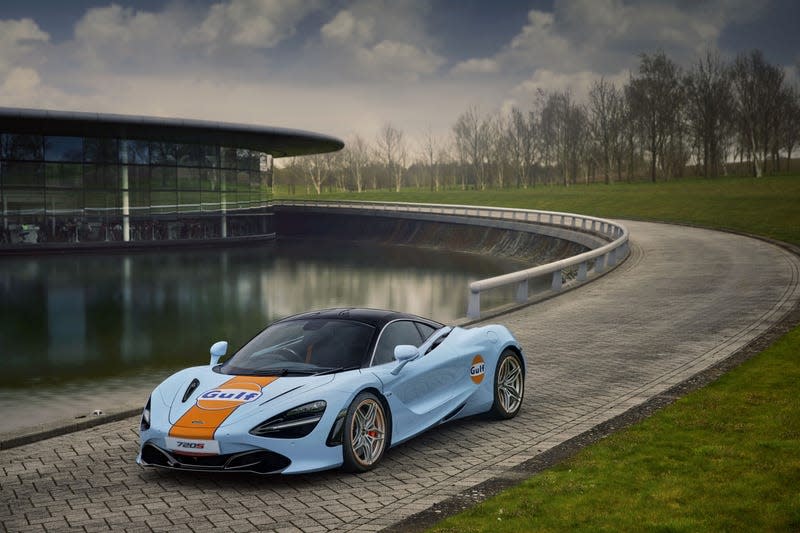 A McLaren 720S wearing a Gulf livery parked by a body of water