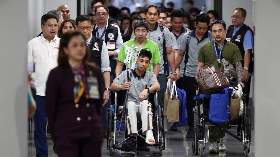 Eleven Filipino seafarers who survived the deadly Houthi attack on the commercial ship True Confidence arrived at Manila International Airport on March 12, 2024. Two Filipino crew members remain in Djibouti to receive medical treatment. - Eloisa Lopez/Reuters