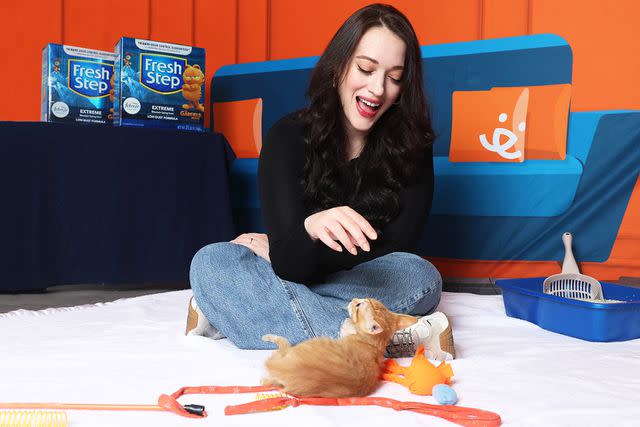 <p>Michael Simon for Fresh Step</p> Kat Dennings poses with a cat for Fresh Step