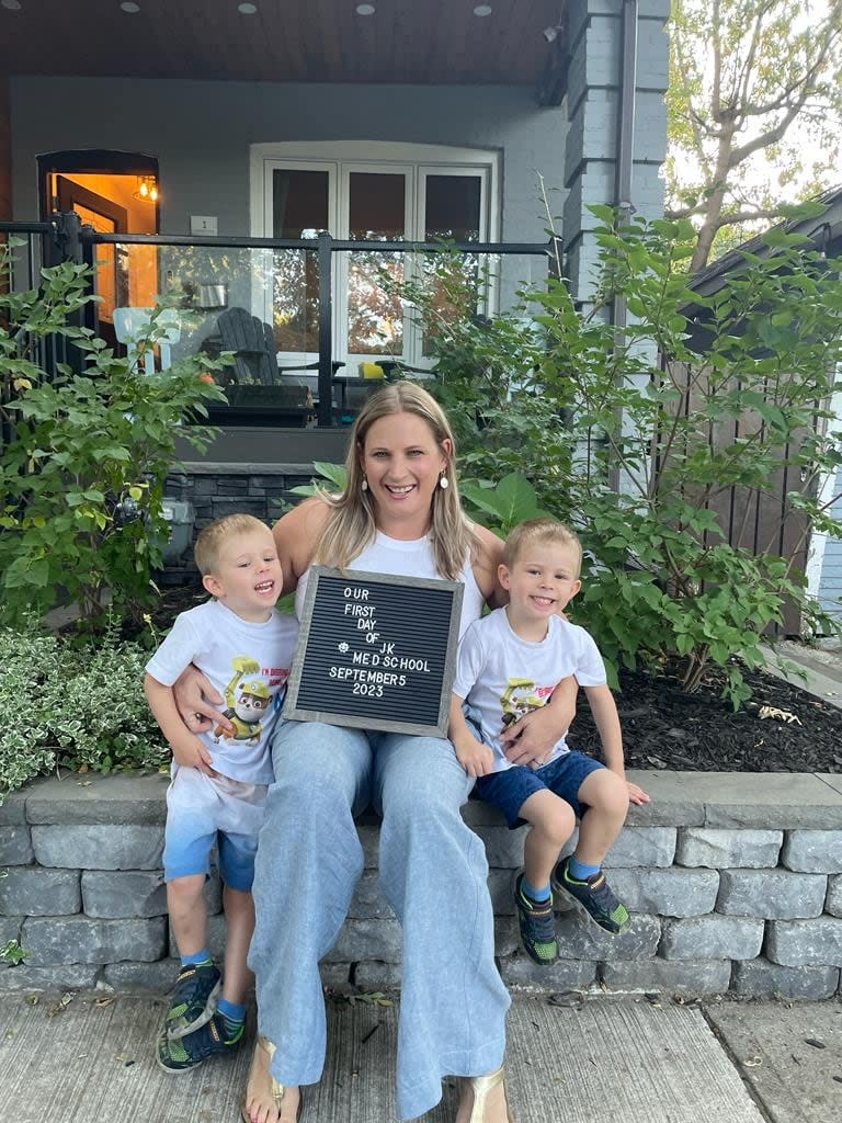 Laura Vresk spent 15 years as a dietician before deciding to become a family doctor. She began medical school in 2023 on the same day her five-year-old twins started junior kindergarten.  (Submitted by Laura Vresk - image credit)