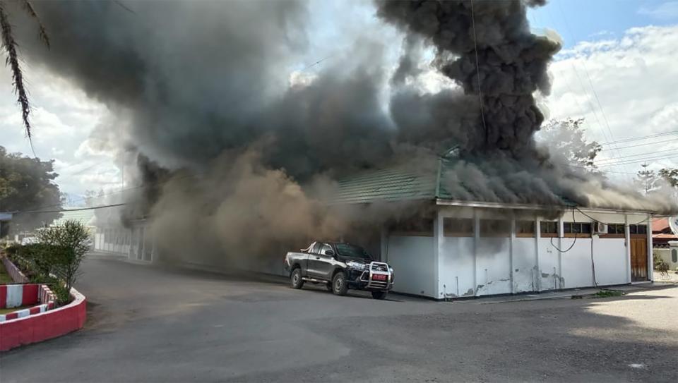 A building burns as fresh protests break out in Wamena, Indonesia, on Sept. 23, 2019.