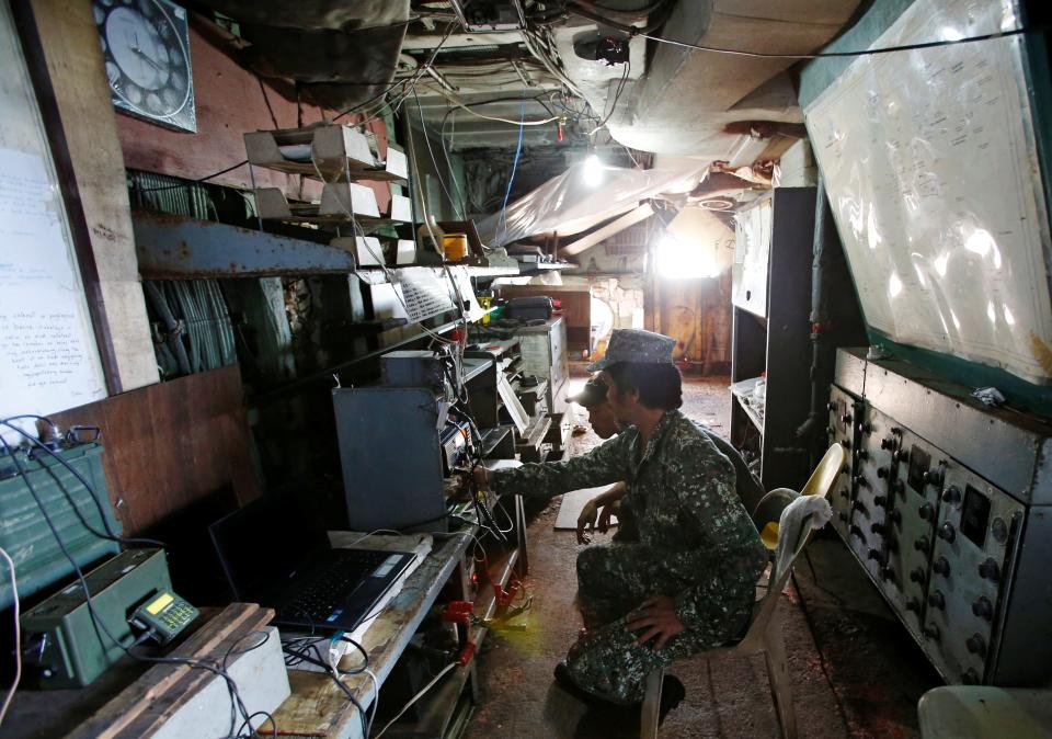 Philippine troops manning their communications room at the Sierra Madre, March 29, 2014.