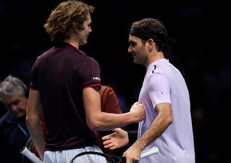Tennis - ATP World Tour Finals - The O2 Arena, London, Britain - November 14, 2017 Switzerland's Roger Federer shakes hands with Germany's Alexander Zverev at the end of the match Action Images via Reuters/Tony O'Brien
