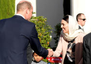 Britain's Prince William greets New Zealand Prime Minister Jacinda Ardern (R) as he arrives at Masjid Al Noor in Christchurch, New Zealand, April 26, 2019. REUTERS/Tracey Nearmy/Pool