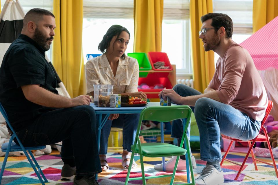 Bobby (Billy Eichner, right) gets some life advice from his married friends Edgar (Guillermo Díaz) and Tina (Monica Raymund) in the romantic comedy "Bros." Eichner was in Provincetown last fall for one day of filming on "Bros" and Monica Raymund has filmed scenes for her STARZ show "Hightown" in Provincetown.