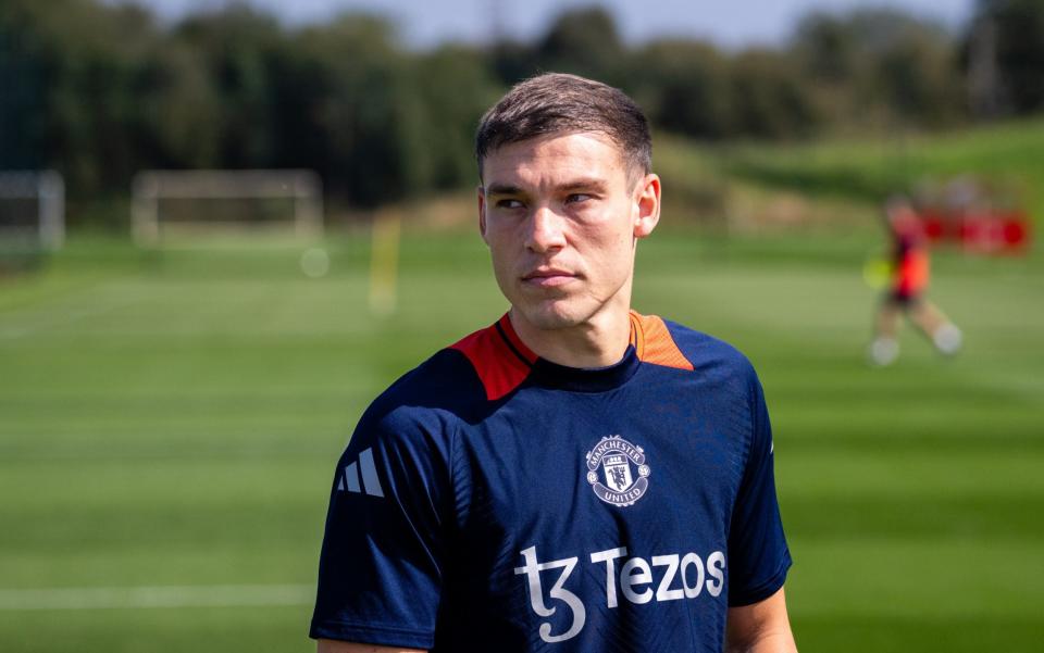 Manuel Ugarte of Manchester United in action during a first team training session at Carrington Training Ground on August 31, 2024 in Manchester, England