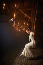 <p>A dramatic image depicted Lopez on a swing, surrounded by chandeliers, <a href="https://people.com/style/see-jennifer-lopez-three-ralph-lauren-wedding-dresses-georgia-ceremony-ben-affleck-photos/" rel="nofollow noopener" target="_blank" data-ylk="slk:in a second Lauren look" class="link ">in a second Lauren look</a>. </p>