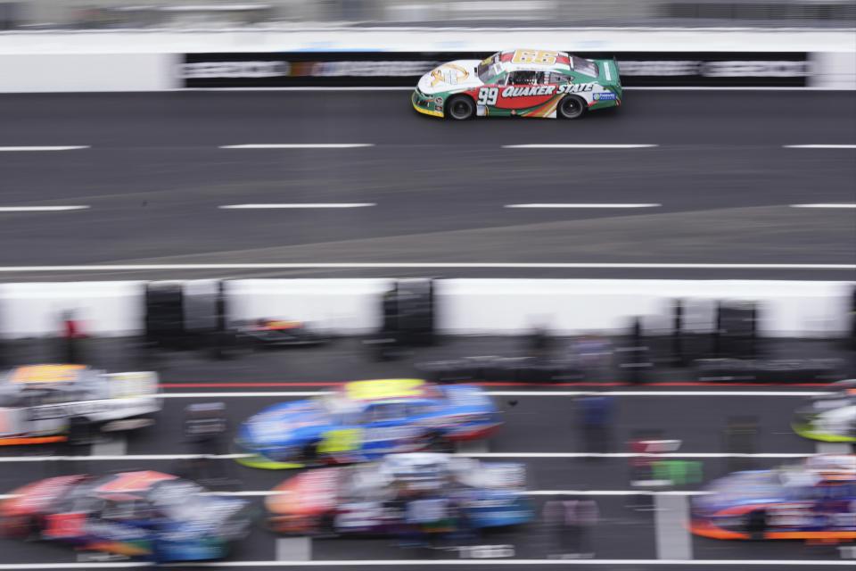 Daniel Suarez (99) drives during qualifying for the NASCAR Mexico Series auto race at Los Angeles Memorial Coliseum Saturday, Feb. 3, 2024, in Los Angeles. (AP Photo/Mark J. Terrill)