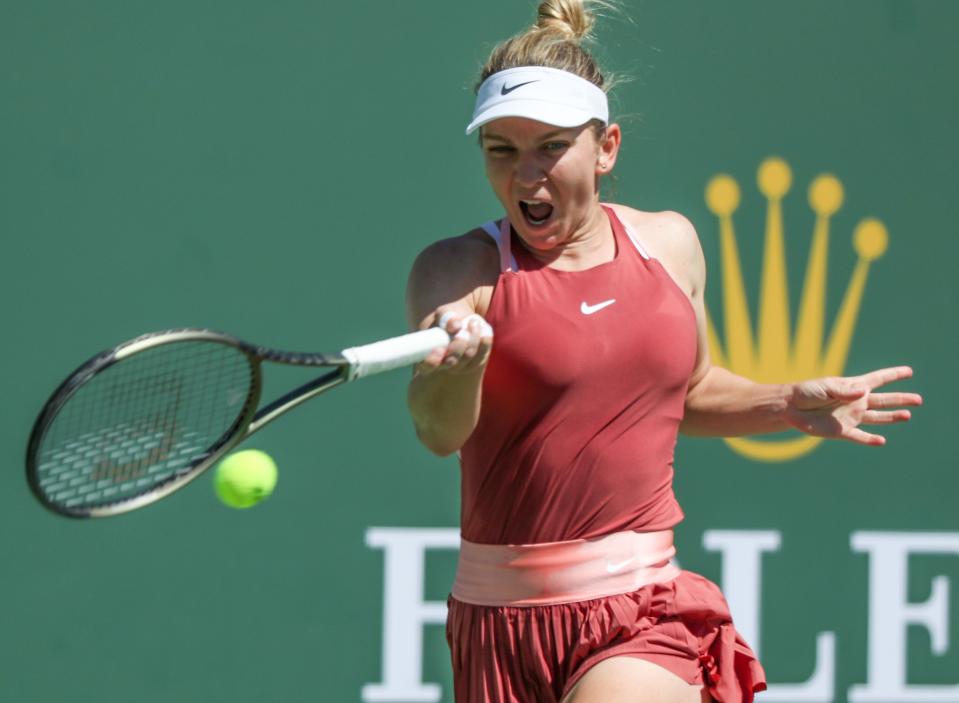 Simona Halep reaches for shot during her win over Sorana Cirstea during the BNP Paribas Open in Indian Wells, Calif., March 15, 2022.