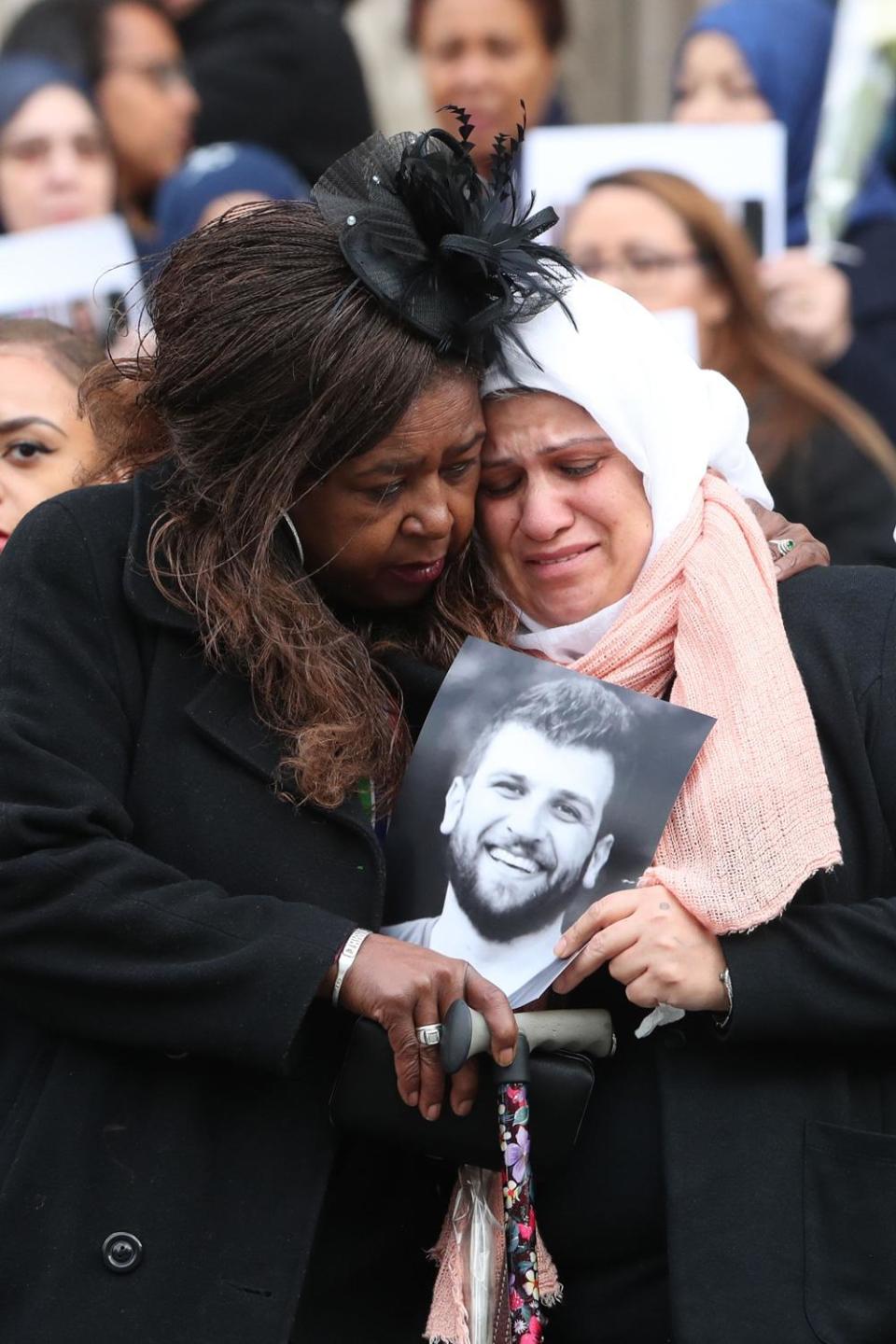 Bereaved family members at today's service (Gareth Fuller/PA )