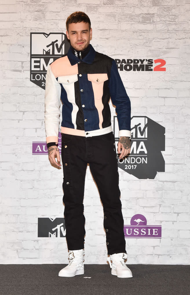 <p>Liam Payne gave color-blocking a go at the awards night in a denim jacket and jeans. (Photo: Getty Images) </p>