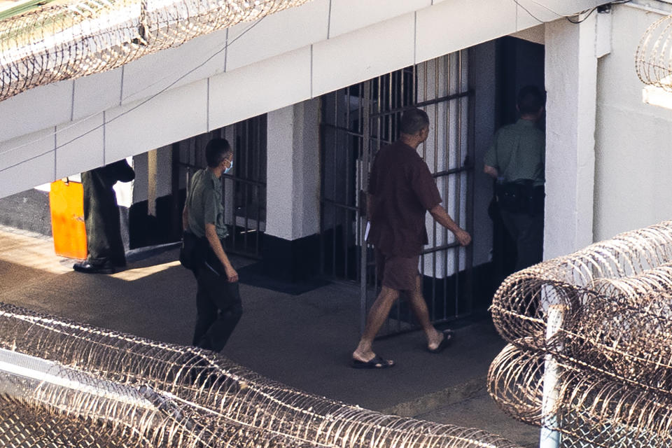 Jimmy Lai enters his building at the Stanley prison in Hong Kong, Friday, July 28, 2023. The Associated Press got a rare glimpse of the jailed 75-year-old publisher and prominent pro-democracy activist Lai. (AP Photo/Louise Delmotte)