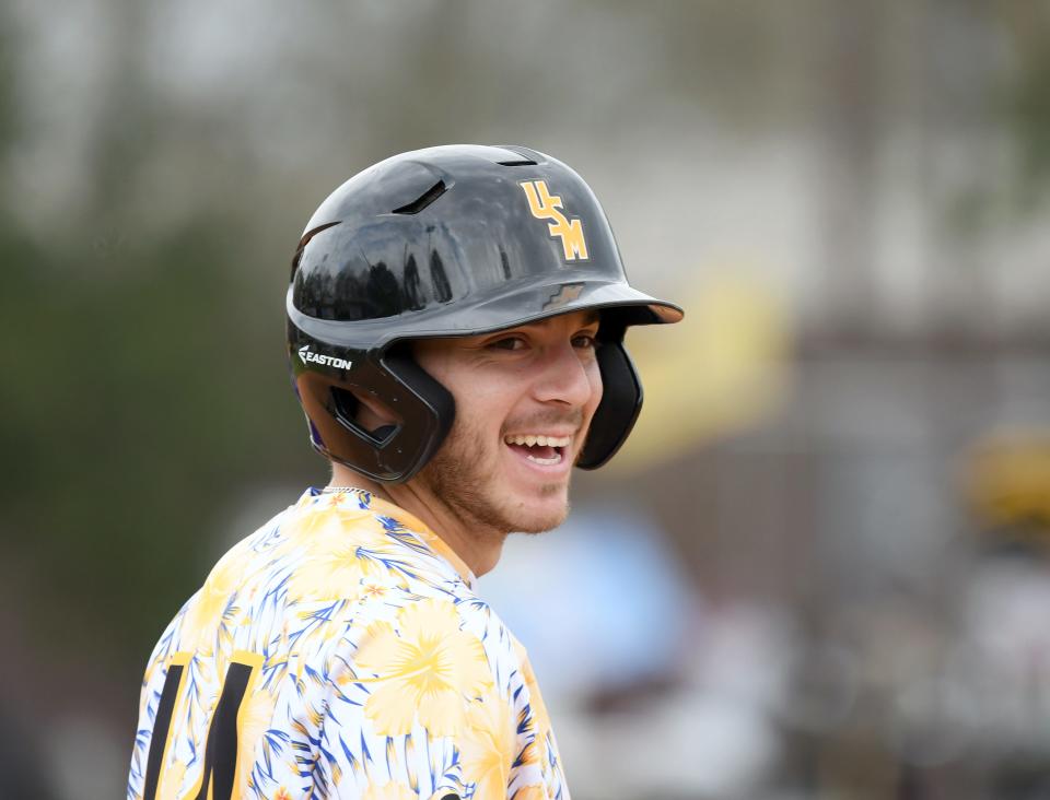 Southern Miss' Gabe Montenegro makes it to third base in a game against Holy Cross at Pete Taylor Park on Friday, March 8, 2019. 