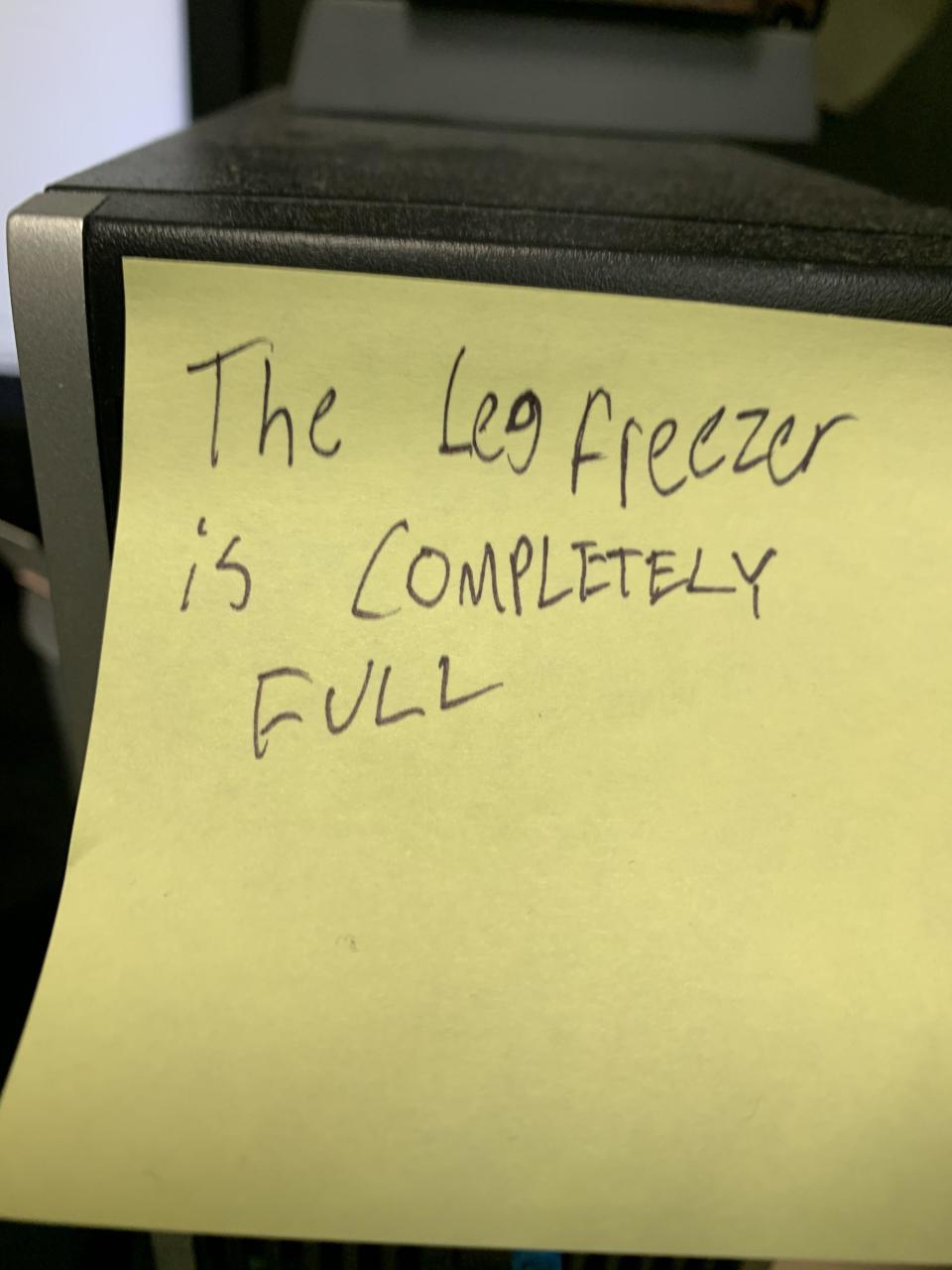 note saying the leg freezer is completely full