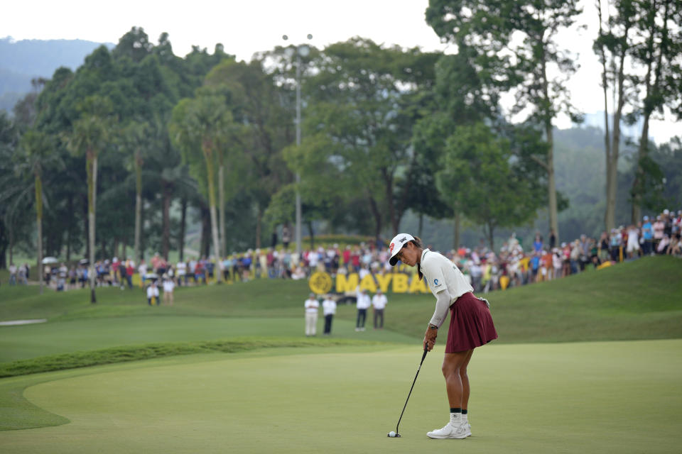 Celine Boutier of France putts on the green during the first play off at the 18th hole during the final round of the LPGA Maybank Championship in Kuala Lumpur, Malaysia, Sunday, Oct. 29, 2023. (AP Photo/Vincent Thian)