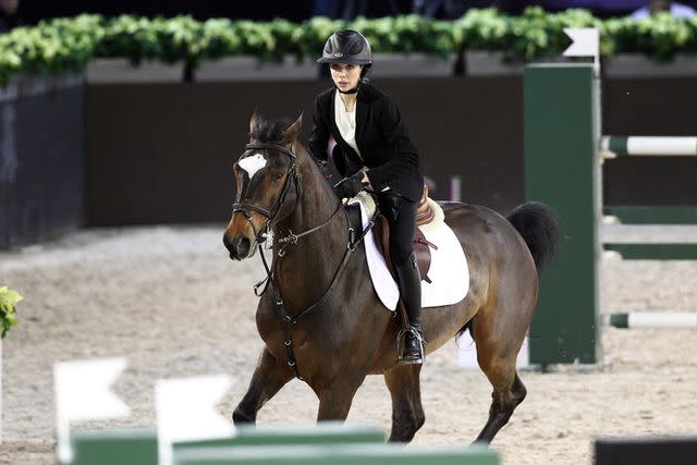 <p>Eric COLOMER/Gamma-Rapho</p> Hannah Selleck at the International Gucci Masters Competition - Day 2 on December 3, 2011.