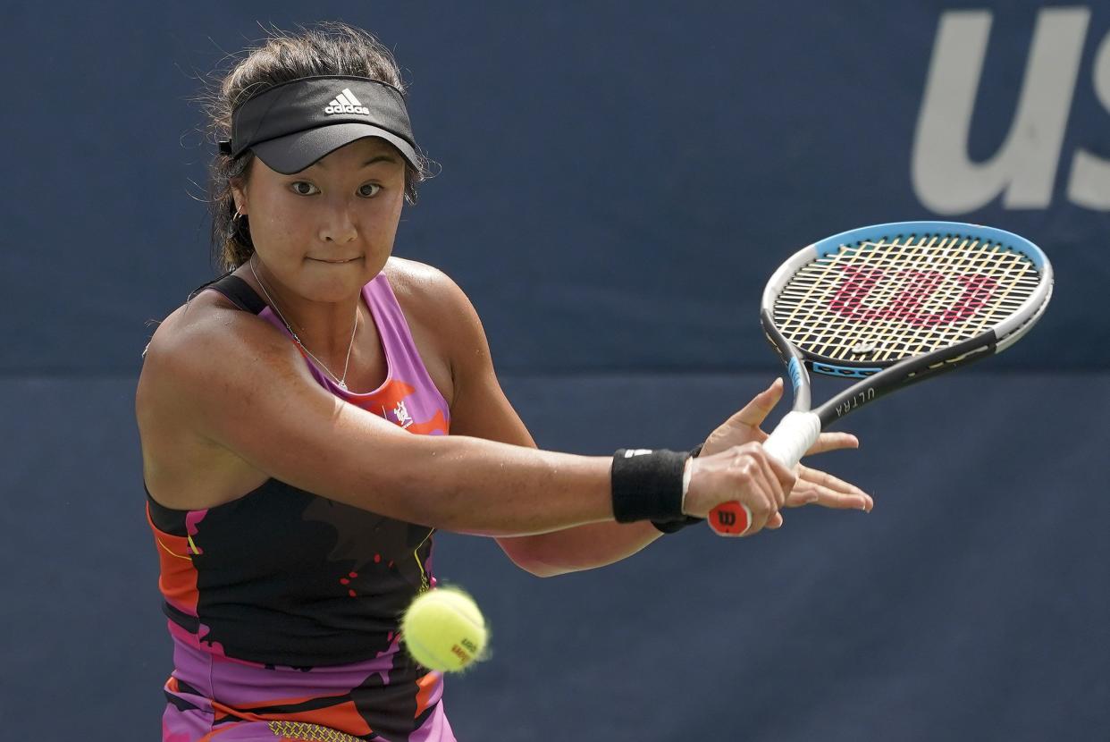 Eleana Yu, of the United States, returns a shot to Alison Riske-Amritraj, of the United States, during the first round of the U.S. Open tennis championships, Monday, Aug. 29, 2022, in New York.