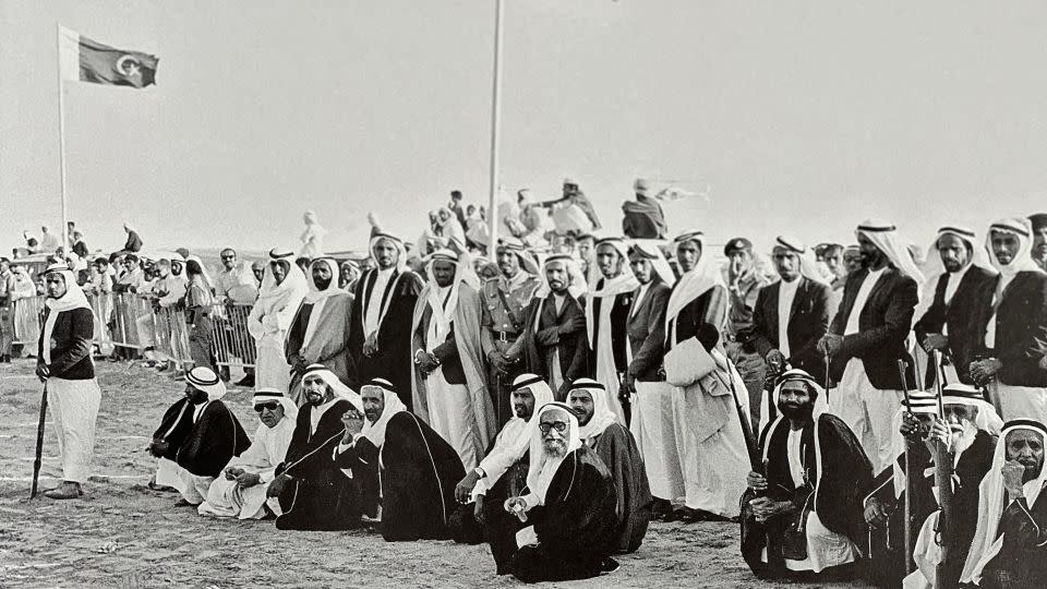 Sheikh Zayed and Sheikh Rashid watching a camel race in Sharjah, 1968. - Ramesh Shukla