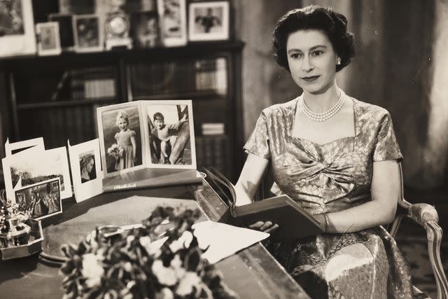 <p>Daily Herald Archive/National Science & Media Museum/SSPL via Getty Images</p> Queen Elizabeth makes her Christmas broadcast at Sandringham in 1957.