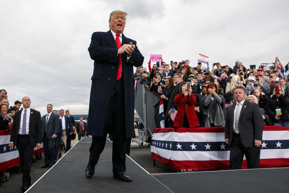 President Donald Trump arrives to speak at a campaign rally at Huntington Tri-State Airport, Friday, Nov. 2, 2018, in Huntington, W.Va. (AP Photo/Evan Vucci)