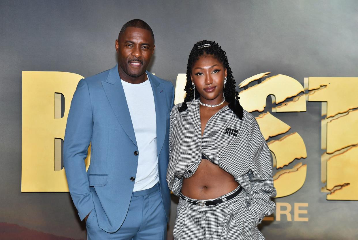 English actor Idris Elba (L) and daughter Isan Elba attend the 