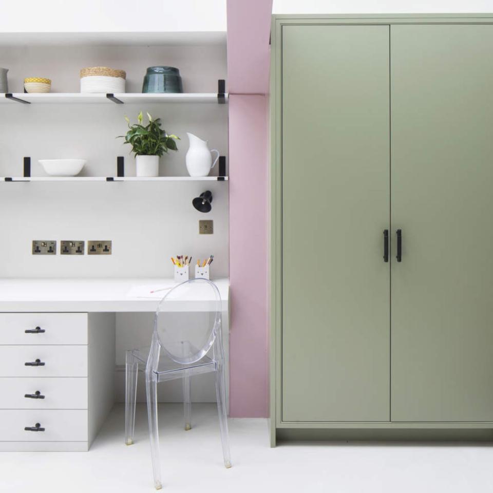 A desk and wardrobe in a teenage girl bedroom