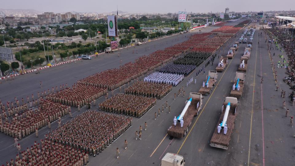 A military parade displaying Houthi forces and weapons moves through a main street of Sanaa, Yemen, on Sept. 21, 2022. Yemen's warring parties face a deadline to renew a 6-month-long truce on Sunday, Oct. 2. (Ansar Allah Media via AP)