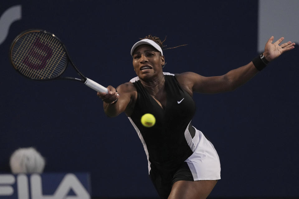 Serena Williams, of the United States, hits a return to Belinda Bencic, of Switzerland, during the National Bank Open tennis tournament Wednesday, Aug. 10, 2022, in Toronto. (Chris Young/The Canadian Press via AP)